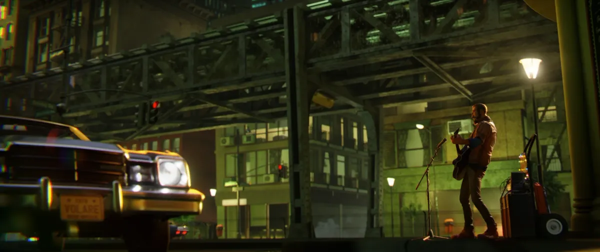 André Jukebox — André playing guitar on a city street at night